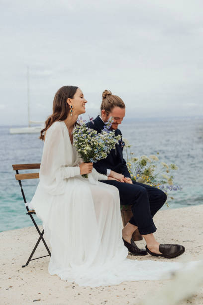 istock Bride and groom at wedding ceremony outdoors 1627330935