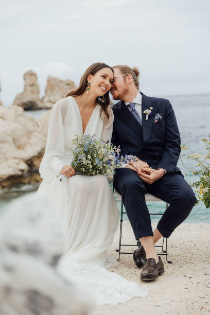 Bride and groom at wedding ceremony outdoors