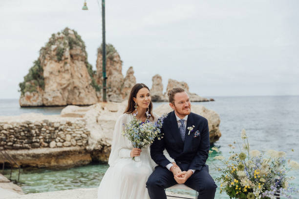 istock Bride and groom at wedding ceremony outdoors 1627330959