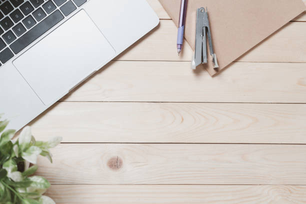 istock Workspace background, Modern business money and financial space for text. layout banner in website. Laptop and office equipment on wood desk. top view, flat lay, free copy 1627351979