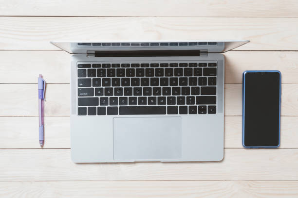istock Workspace background, Modern business money and financial space for text. layout banner in website. Laptop and office equipment on wood desk. top view, flat lay, free copy 1627354010