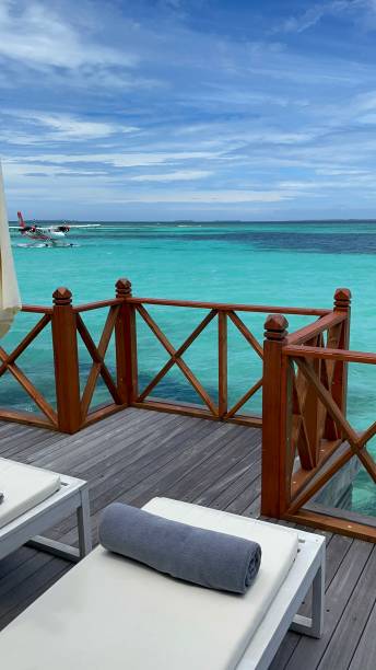 istock Maldive resort with airplane 1627354610