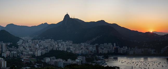 Rio de Janeiro, Brazil: panoramic view at sunset from Sugarloaf Mountain with view of Humaitá district, Mount Corcovado, Botafogo district and beach