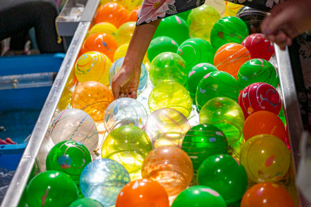 istock water balloon fishing. 1627362112