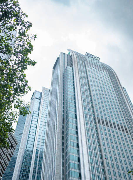 istock commercial buildings in a cloudy day vertical composition 1627376482