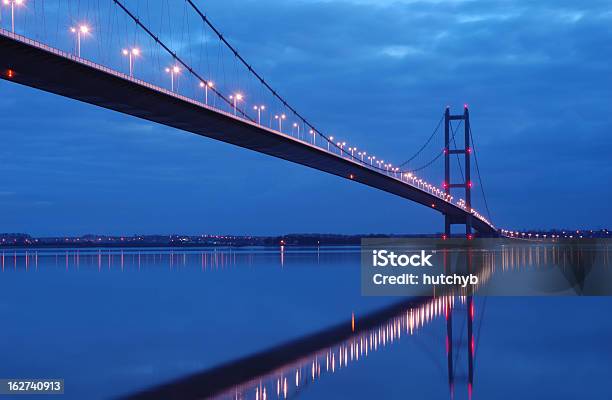 Humber Bridge Glowing At Night Stock Photo - Download Image Now - Kingston upon Hull, Humber Bridge, East Riding Of Yorkshire