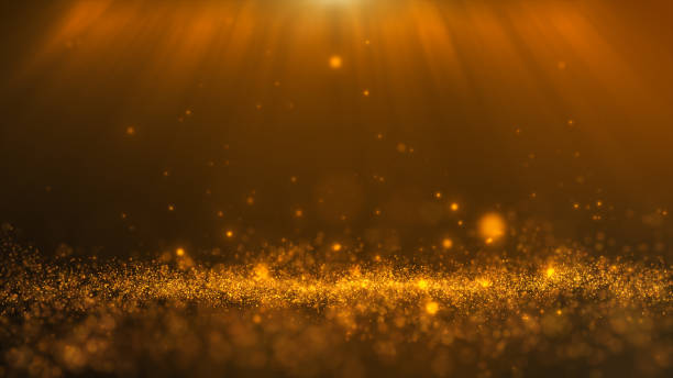 istock Glitter light gold particles stage and light shine background. 1627427544