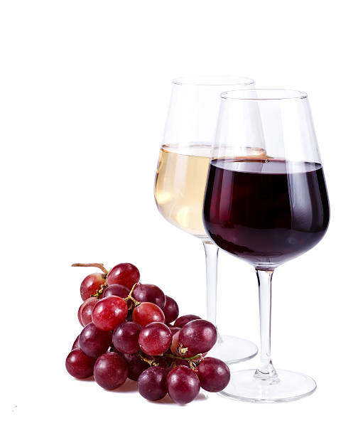 istock two wineglasses with red and white wine, grapes 162742820