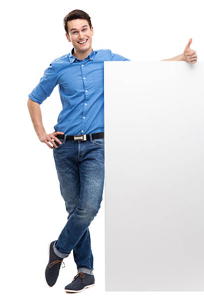 istock Man with blank poster showing thumbs up 162742889