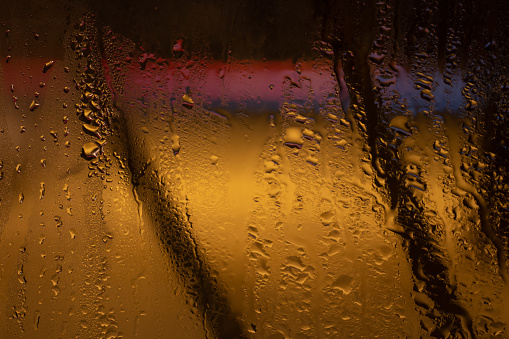 raindrops on the glass in the late evening