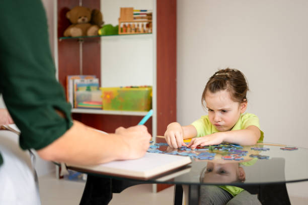 istock Girl at child psychologist's office 1627465527