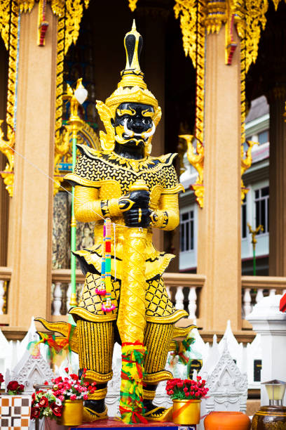 istock Standing big Black and gold colored Thai warrior statue 1627465549