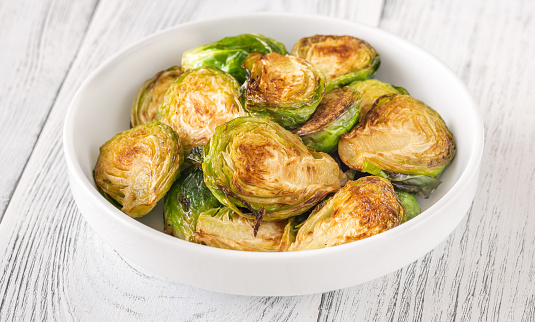 Roasted Brussels sprouts in the white bowl