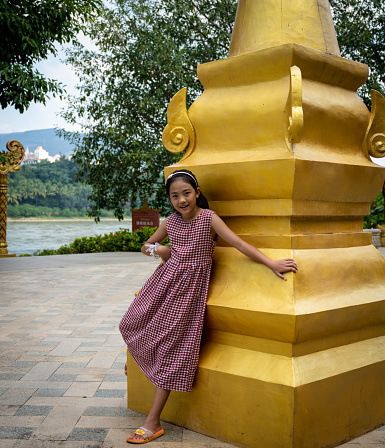 Picture of an Asian girl by the Mekong River
