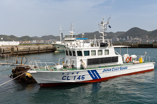 Shimonoseki, Japan - April 18, 2023 :  Japanese Coast Guard boat, CL 146 Hikokaze, docked at Shimonoseki in Yamaguchi Prefecture, Japan.