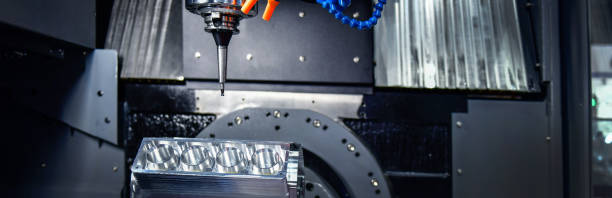 istock CNC mills machines for design configuration that utilizes a swivel head machine table and flush with the surface metalworking 1627507781