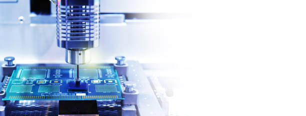 istock Technological process of soldering and assembly chip components on pcb board. Automated soldering machine inside at industrial 1627507793