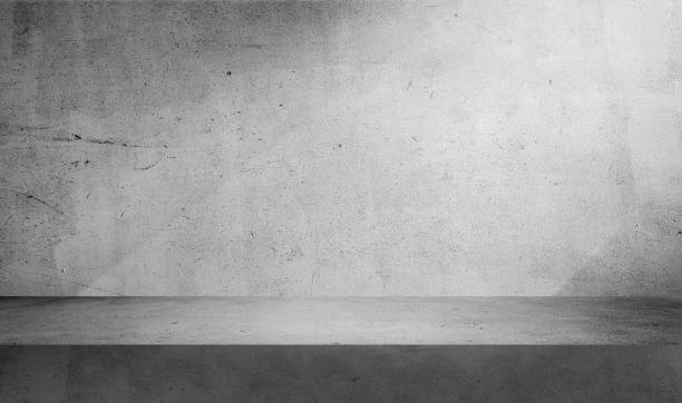 minimal abstract grey concrete background with light for product presentation. shadow and light from windows on rustic plaster wall. grey studio backdrop.