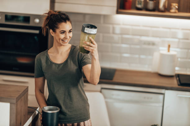 istock Woman Making A Healthy Smoothie At Home 1627575220