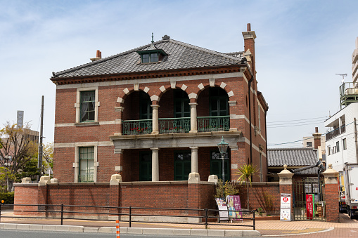 Shimonoseki, Japan - April 18, 2023 : General view of the Former British Consulate in Shimonoseki, Yamaguchi Prefecture, Japan. Constructed in 1906, this building is the oldest existing consulate building in Japan.