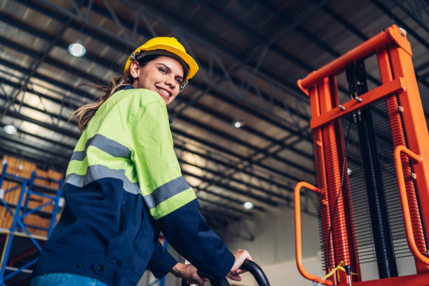 istock Warehouse worker working in warehouse storage. Foreman or worker work at factory site check up products in site. Inventory worker working in  factory Storehouse 1627584303