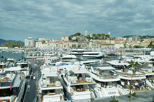 Scenic view of boats and luxury yachts moored in Fontvielle harbour and marina of Monte Carlo, Monaco, South of France.