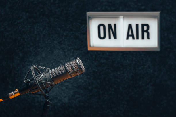 istock Professional microphone and on air sign 1627597194