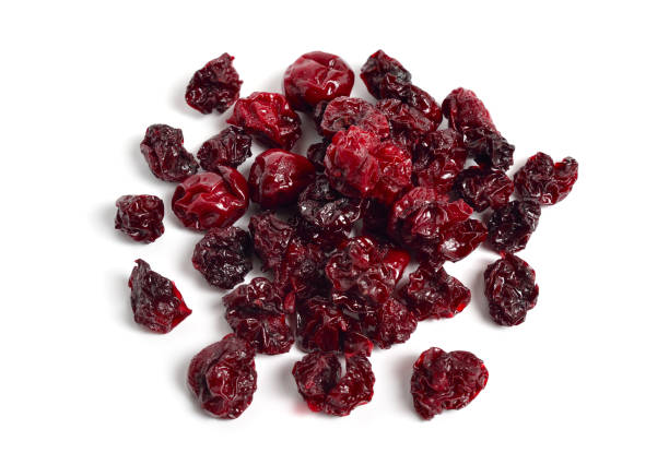 istock Dried cherry heap isolated on white background 1627608648