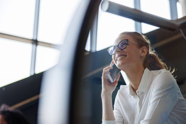 istock Friendly Ginger Lady Smiling While Talking On The Phone With A Friend 1627622326