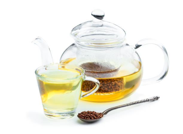 istock Buckwheat tea in transparent teapot isolated on white 1627629964
