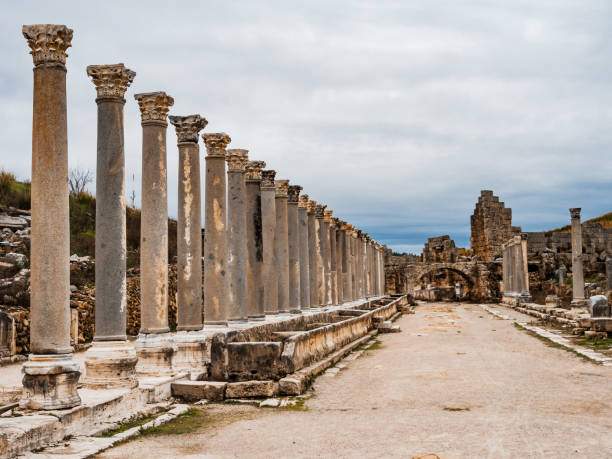 istock Wide path for people in the ancient city with columns 1627642673