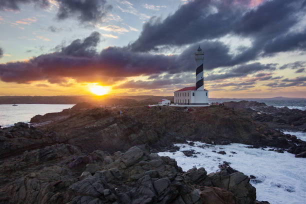 istock Sunset from Favaritx lighthouse in Menorca (Spain) 1627649988