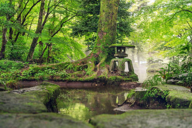 Japanese lantern on a pond in Gifu Park, Gifu, Japan.