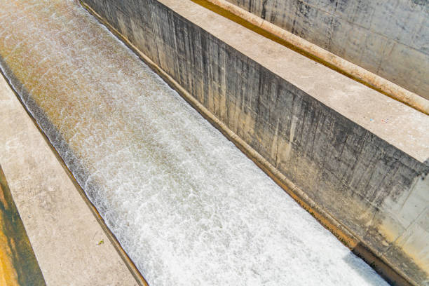 The old dam. An artificial lake (reservoir) near Nha Trang in Vietnam. technical routine stock pictures, royalty-free photos & images