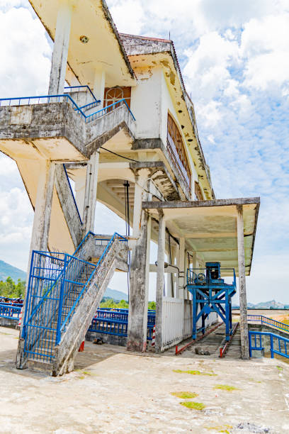 The old dam. An artificial lake (reservoir) near Nha Trang in Vietnam. technical routine stock pictures, royalty-free photos & images