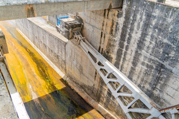 The old dam. An artificial lake (reservoir) near Nha Trang in Vietnam. technical routine stock pictures, royalty-free photos & images