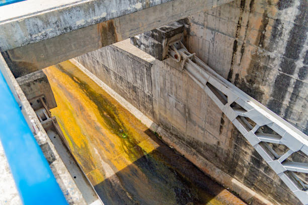 The old dam. An artificial lake (reservoir) near Nha Trang in Vietnam. technical routine stock pictures, royalty-free photos & images