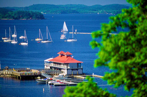 Burlington Boathouse, Burlington, VT., Vermont.  This new boathouse was built to match the original boathouse that fell into disrepair.  The boathouse has restaurants, music and dockage.  Lake Champlain is the 6th largest lake in the USA.  It is the next largest lake after the Great Lakes and in fact there was a bill proposed in Congress to make it part of the Great Lakes.  The bill failed, but LC is the Greatest Lake.  It borders Vermont, Upstate New York and Canada.  It is 15 miles wide, 115 miles long and 400 feet deep.