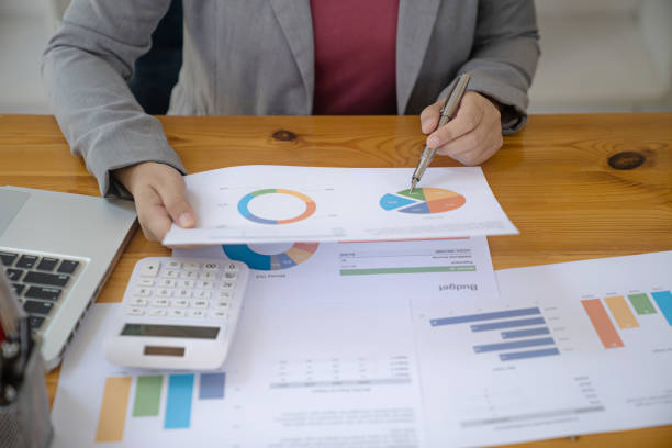 istock Business Professional Accountant Woman working on laptop computer making research for planning startup at desktop working process in office 1627710110