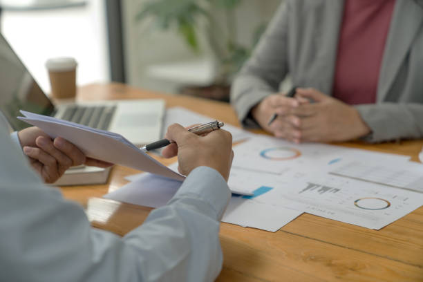 istock Startup business people teamwork calculating a valuation in workplace. 1627710124