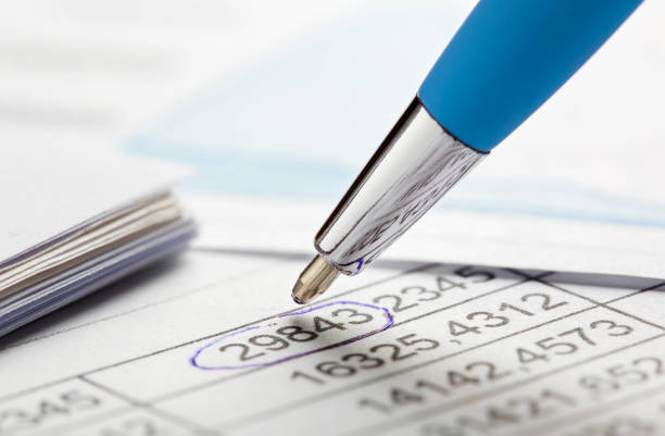 istock Accounting document with pen, share listing and checking financial chart. Concept of banking, financial report and financial audit. 1627765114