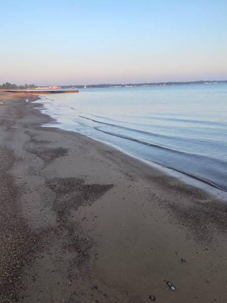 istock Looking down a sandy beach in the morning 1627791924