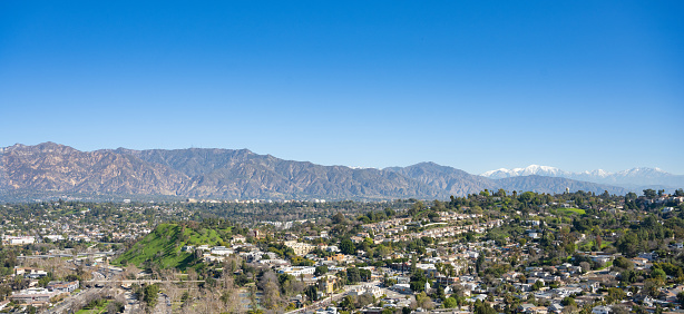 Pasadena and South Pasadena with San Gabriel Mountains in the background and Arroyo Parkway in the foreground.