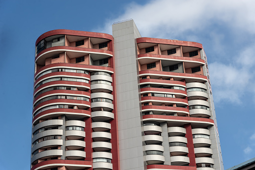 Salvador, Bahia, Brazil - August 11, 2023: Low view of a modern high-rise commercial building located on Avenida Tancredo Neves in Salvador, Bahia.