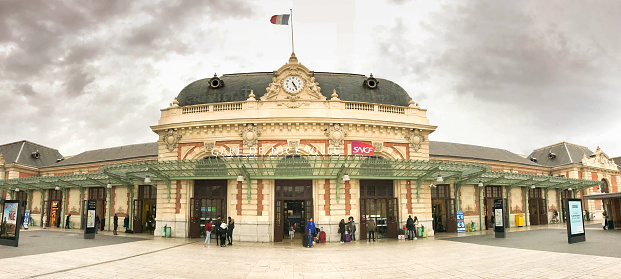 Nice, France - January 2016: Front exterior panoramic view of the Gare de Nice railway station on the French Riviera