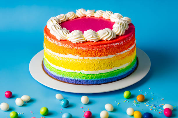 istock Colorful multicolored cake with icing and candies 1627910879