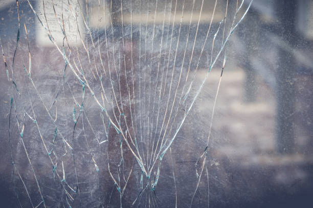 istock glass pane break in close up view 1627952768