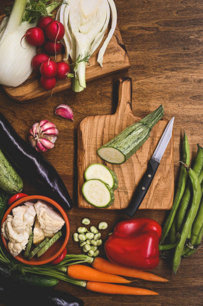 istock cooking ripe vegetables, table top view. 1627967822