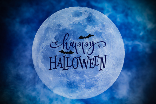 Happy Halloween card. Full moon in the night and Happy Halloween text in silhouette. Not AI