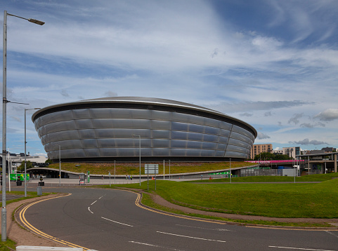 Glasgow, Scotland - 23rd July 2023: Exterior of the Ovo Hydro, a very well-visited concert and event venue within the Scottish Events Campus, in the Finnieston Quay area of Glasgow, Scotland. It was opened in 2013, and is the busiest venue in the UK.